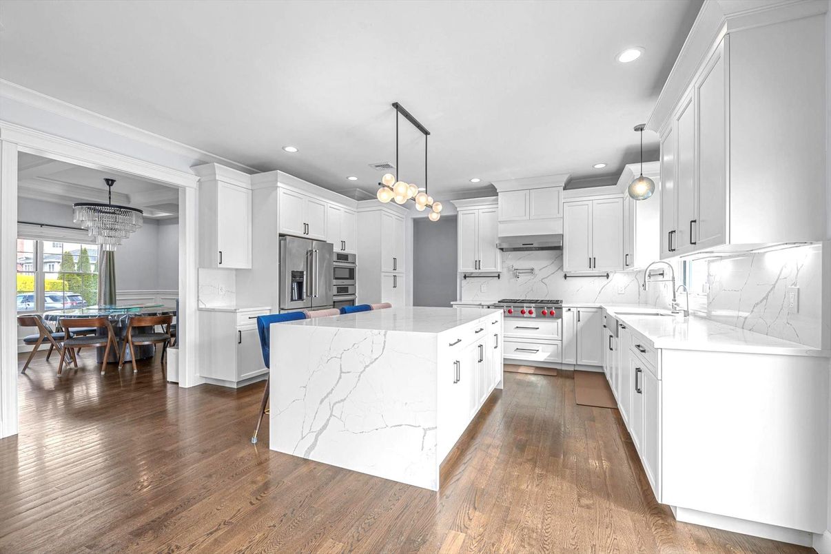 Chandelier, Dining room, Interior, Kitchen, Pendant Lights, Recessed Lighting, Stainless Steel Appliances, Wood Texture Flooring