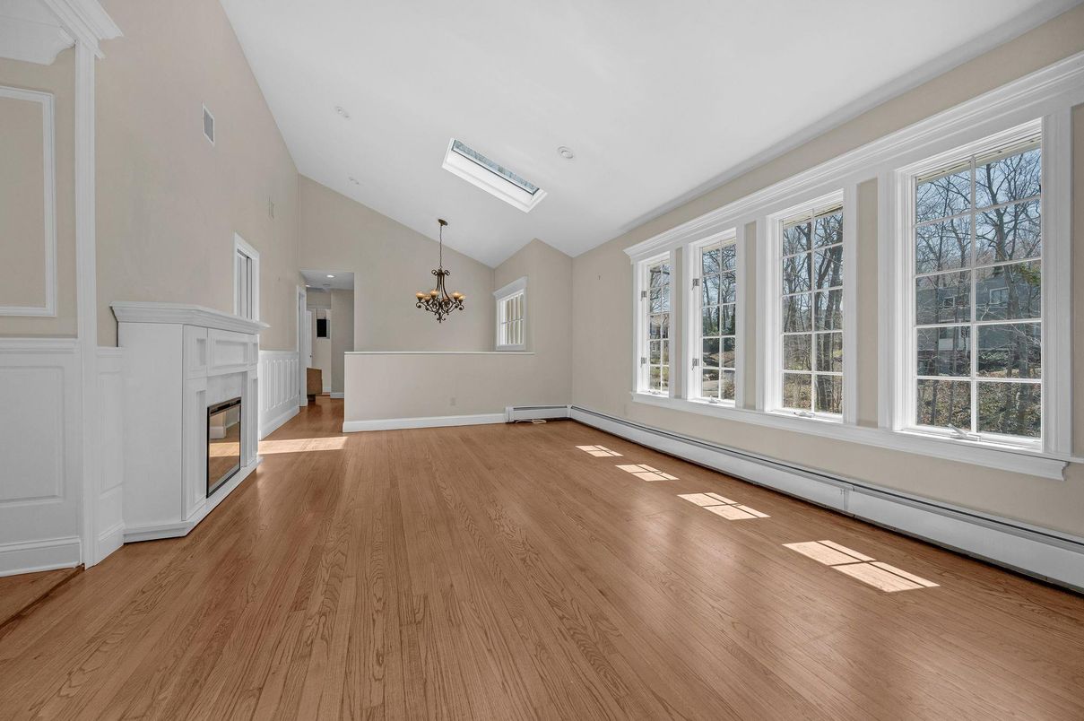 Chandelier, Empty room, Fireplace, Interior, Wood Texture Flooring