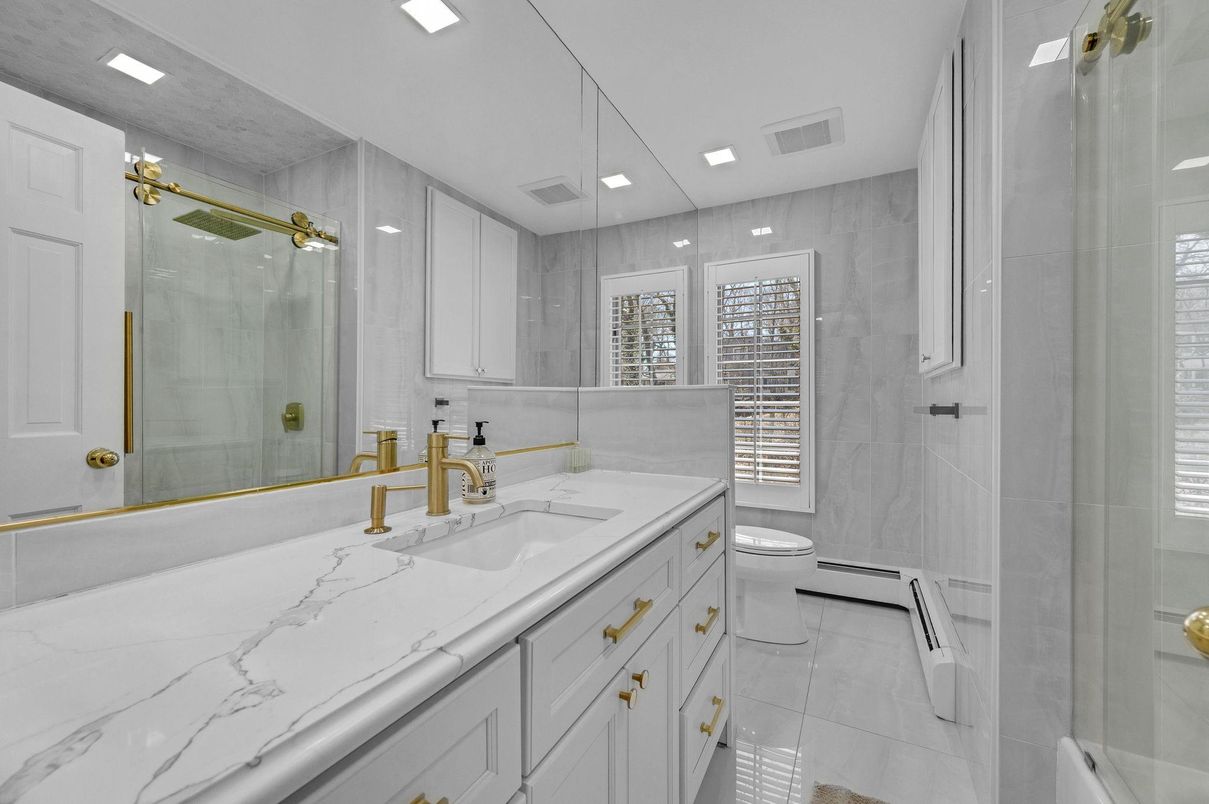 Bathroom, Dual Sink Vanities, Glass Shower, Interior, Marble, Recessed Lighting