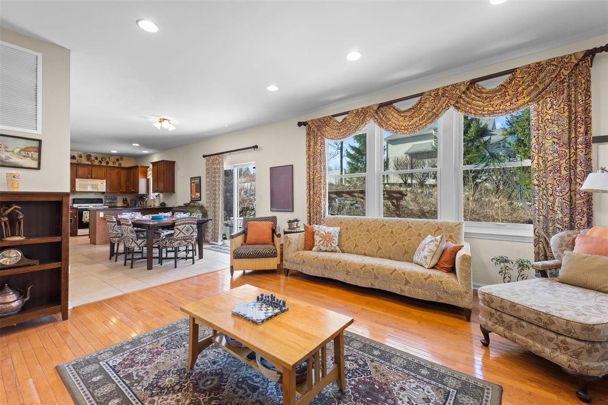 Dining room, Interior, Kitchen, Living room, Recessed Lighting, Stainless Steel Appliances, Wood Texture Flooring