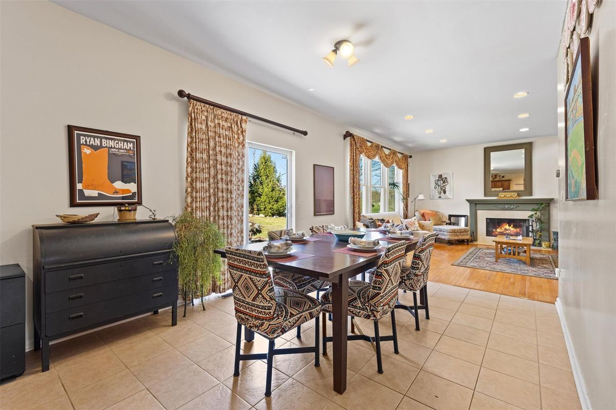 Dining room, Fireplace, Interior, Living room, Recessed Lighting, Wood Texture Flooring