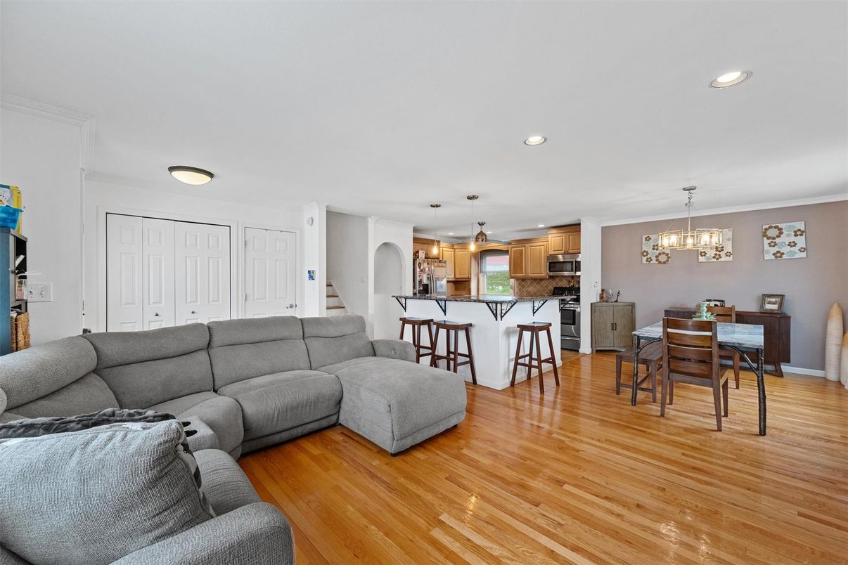 Dining room, Interior, Kitchen, Living room, Pendant Lights, Recessed Lighting, Stainless Steel Appliances, Wood Texture Flooring