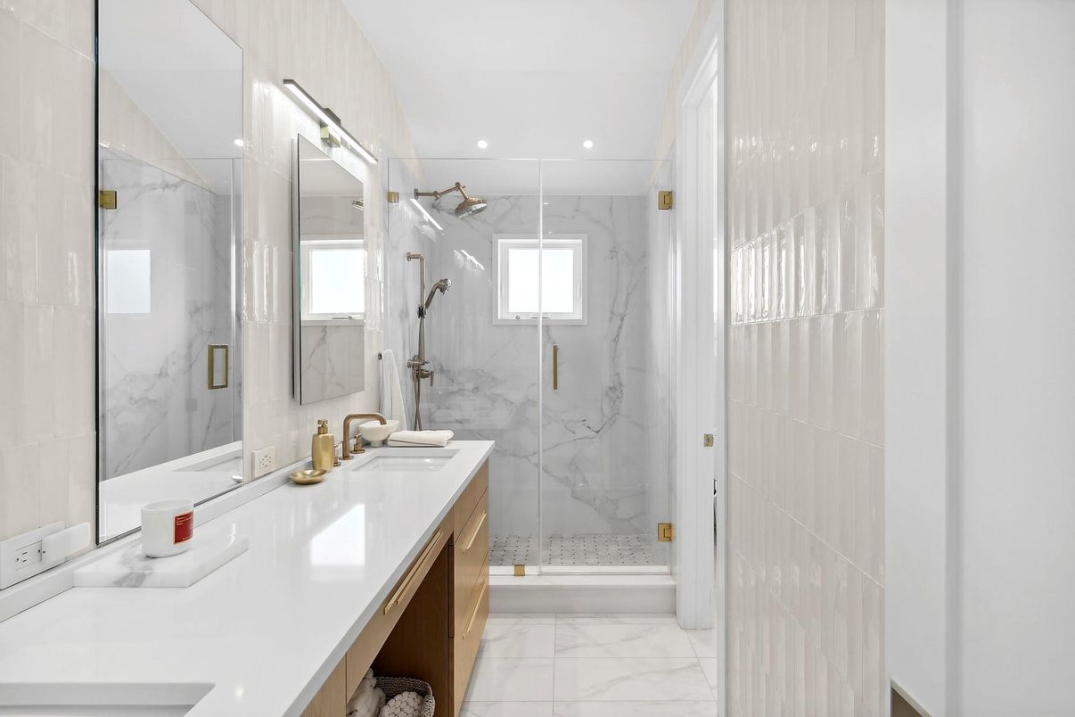 Bathroom, Dual Sink Vanities, Glass Shower, Interior, Marble, Marble Walls, Recessed Lighting