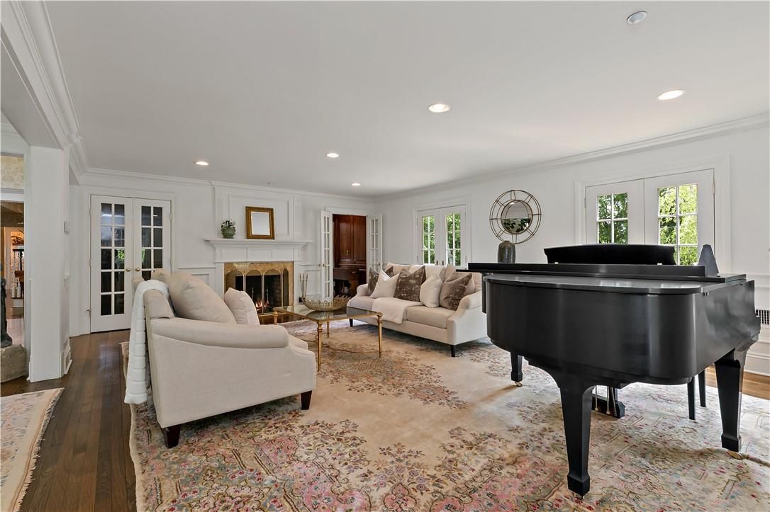 Fireplace, Interior, Living room, Piano, Recessed Lighting, Wood Texture Flooring