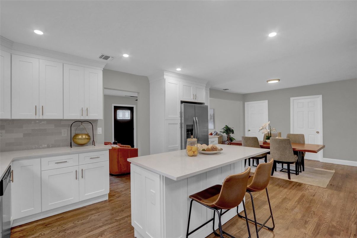 Dining room, Interior, Kitchen, Recessed Lighting, Stainless Steel Appliances, Wood Texture Flooring