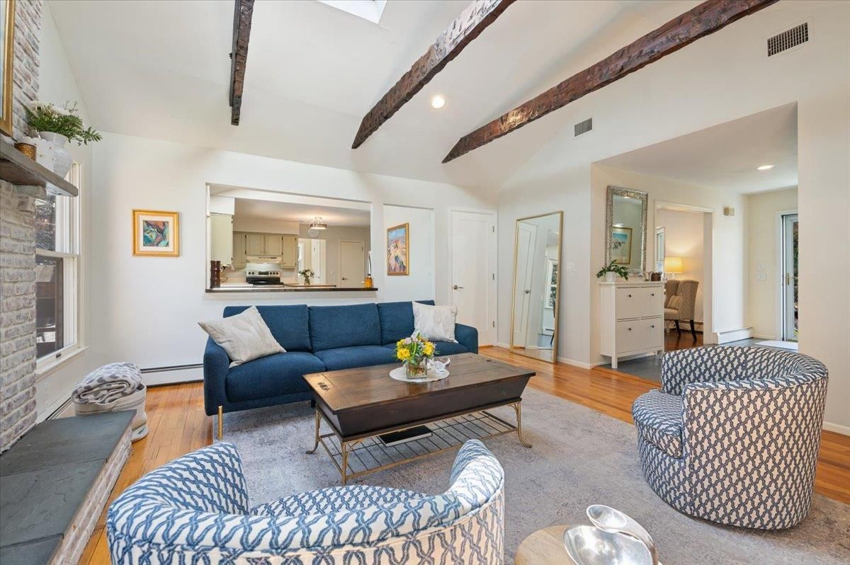 Fireplace, Interior, Kitchen, Living room, Recessed Lighting, Stainless Steel Appliances, Stone Walls, Wooden Beams, Wood Texture Flooring
