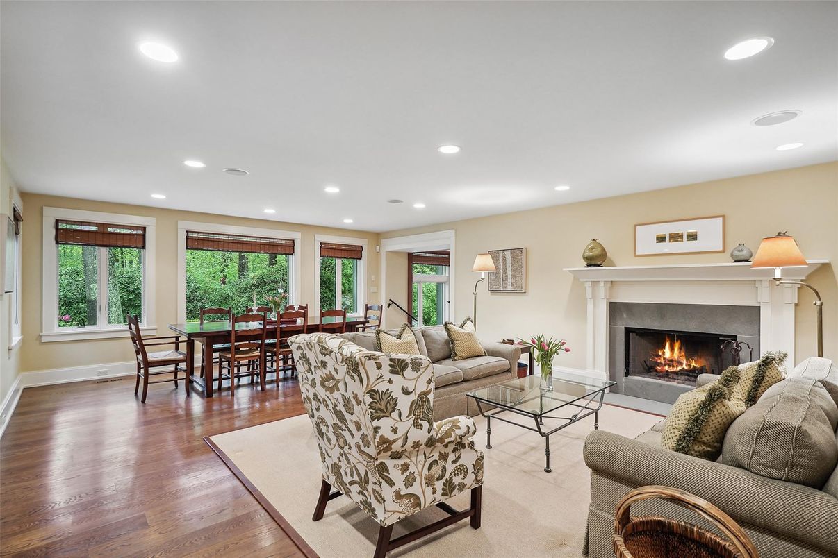 Dining room, Fireplace, Interior, Living room, Recessed Lighting, Wood Texture Flooring