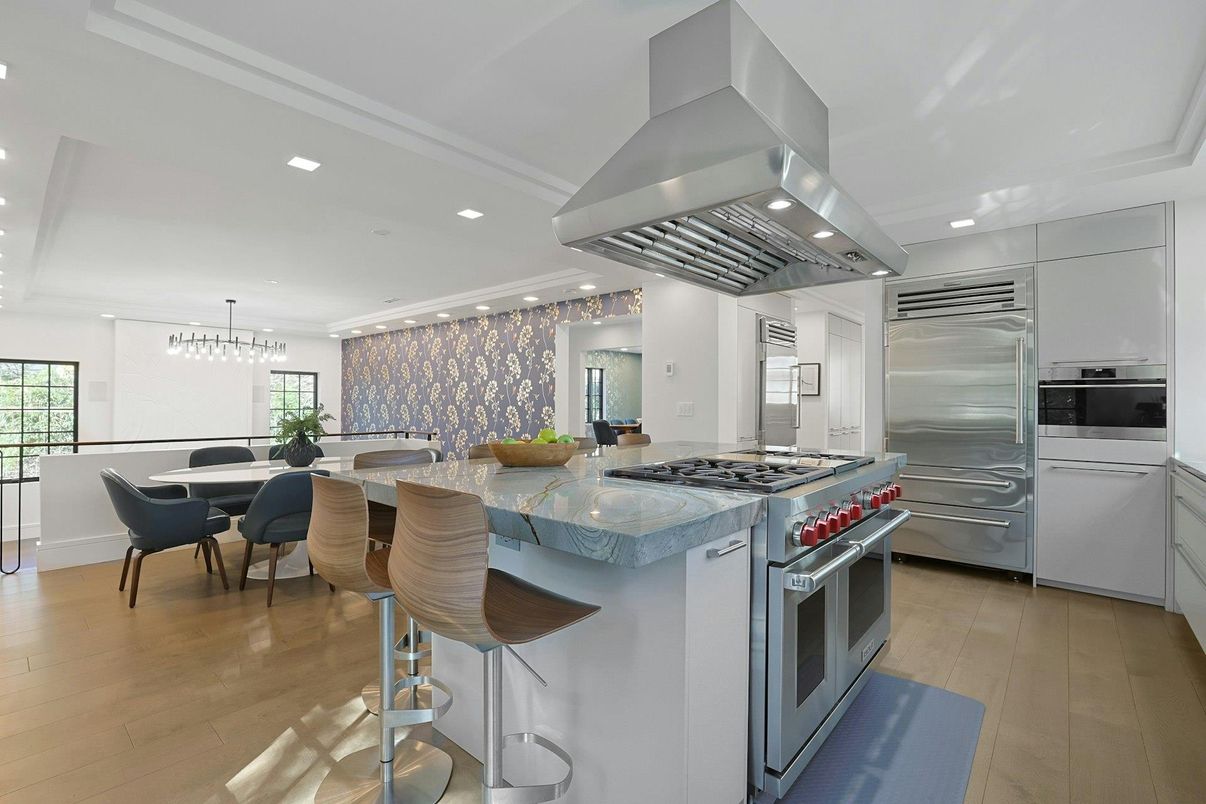 Chandelier, Dining room, Interior, Kitchen, Pendant Lights, Recessed Lighting, Stainless Steel Appliances, Wood Texture Flooring