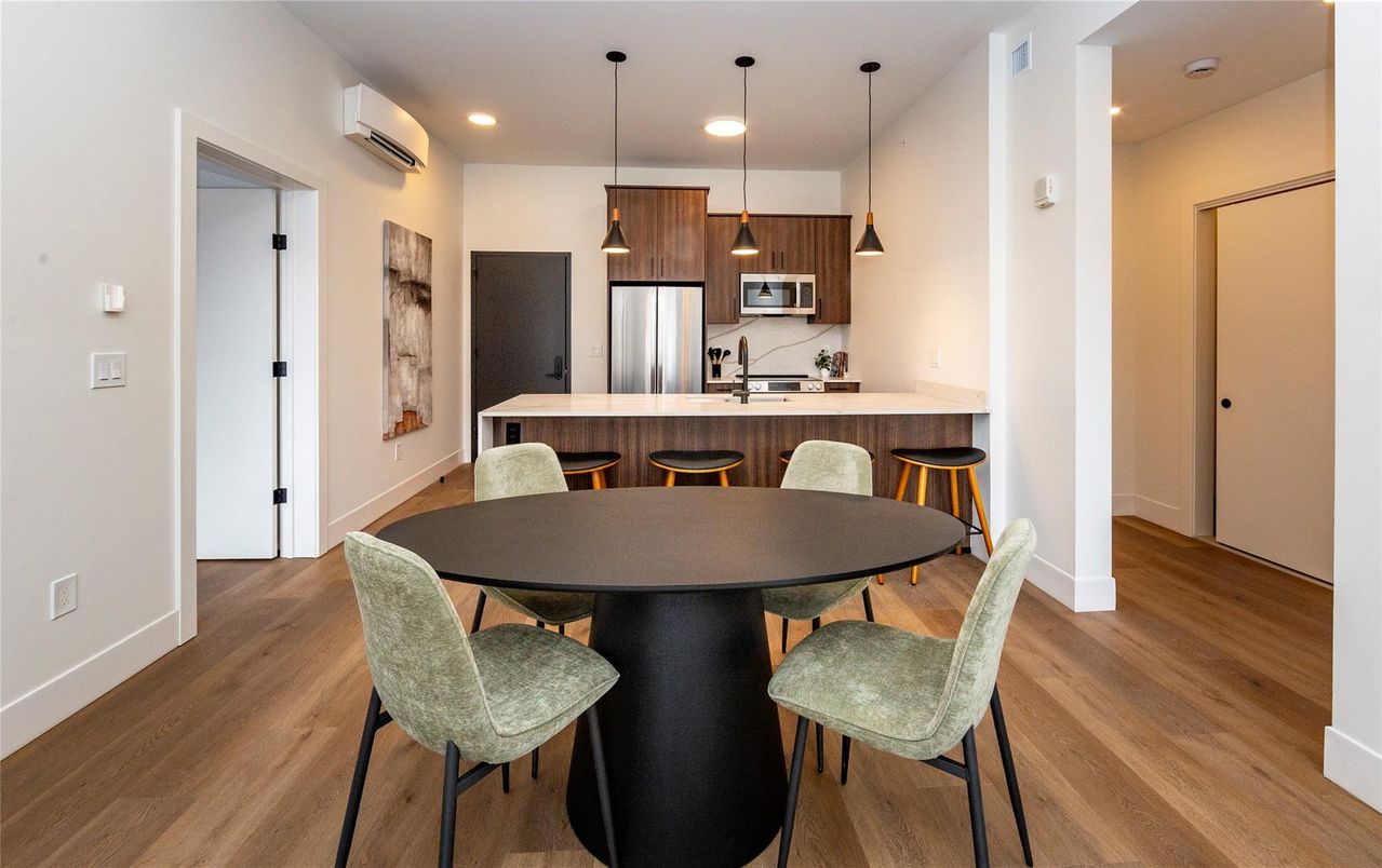 Dining room, Interior, Kitchen, Pendant Lights, Recessed Lighting, Stainless Steel Appliances, Wood Texture Flooring
