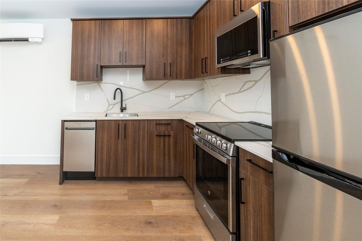 Interior, Kitchen, Marble Walls, Stainless Steel Appliances, Wood Texture Flooring
