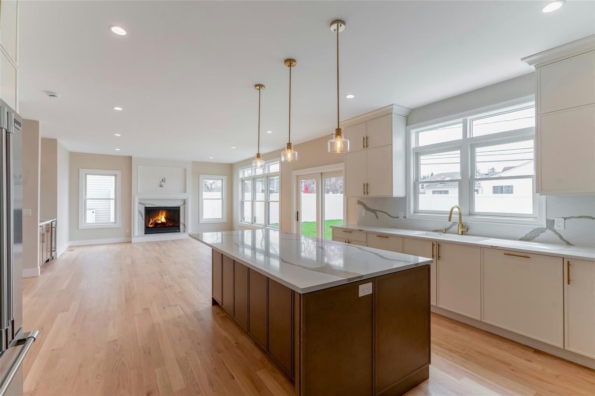 Fireplace, Interior, Kitchen, Pendant Lights, Recessed Lighting, Wood Texture Flooring
