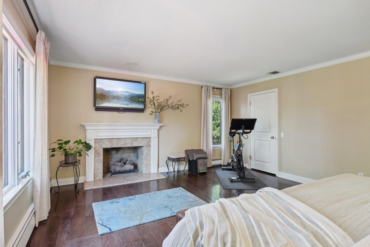Bedroom, Fireplace, Fitness Equipment, Interior, Wood Texture Flooring