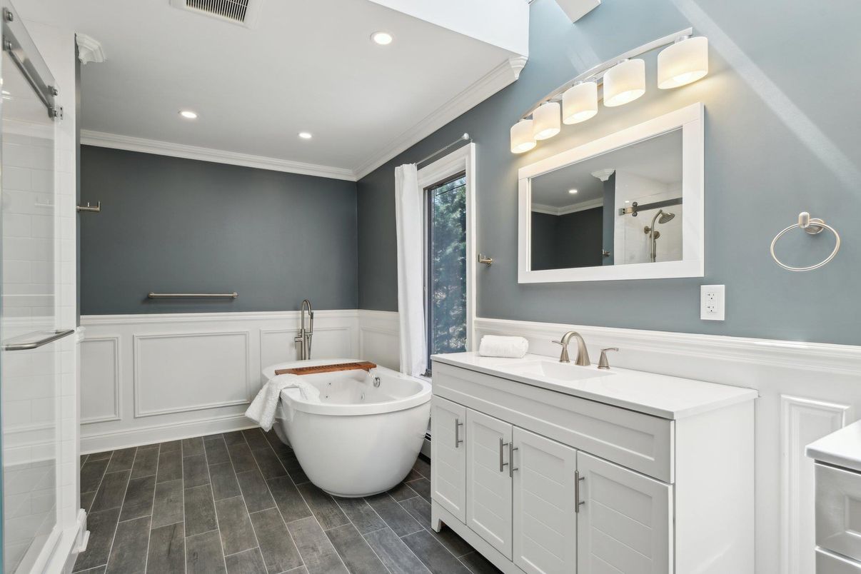Bathroom, Dual Sink Vanities, Free Standing Baths, Interior, Recessed Lighting, Wood Texture Flooring