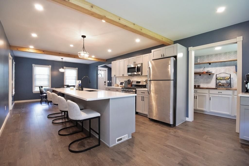 Dining room, Interior, Kitchen, Pendant Lights, Recessed Lighting, Stainless Steel Appliances, Wooden Beams, Wood Texture Flooring