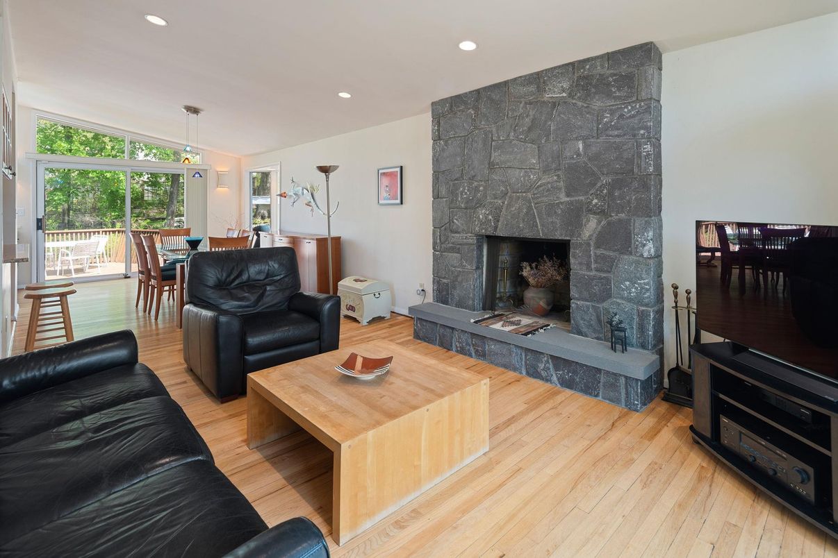 Dining room, Fireplace, Interior, Living room, Pendant Lights, Recessed Lighting, Wood Texture Flooring