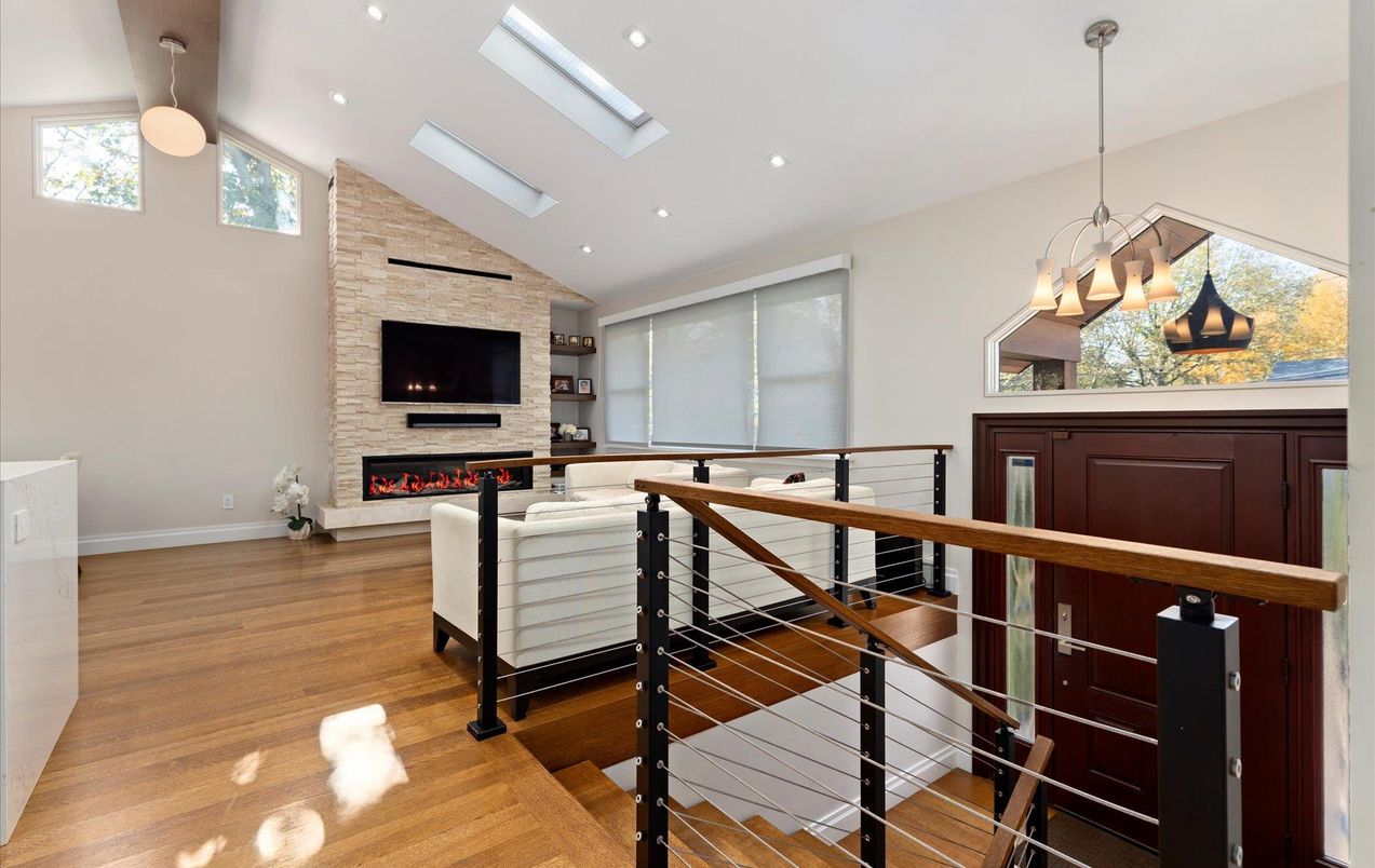 Fireplace, Interior, Living room, Pendant Lights, Recessed Lighting, Stone Walls, Wood Texture Flooring