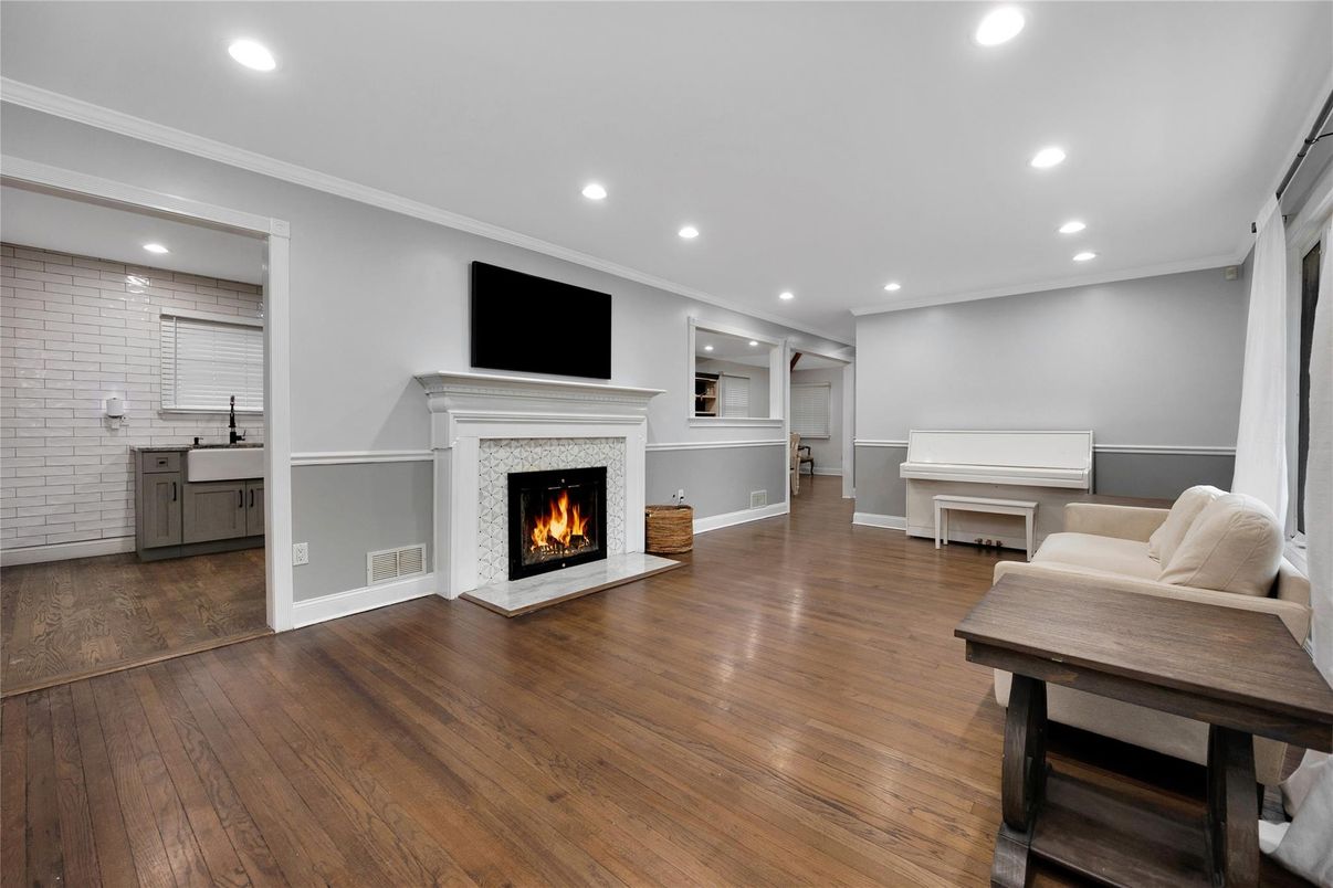 Fireplace, Interior, Piano, Recessed Lighting, Wood Texture Flooring