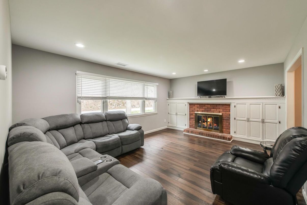 Fireplace, Interior, Living room, Recessed Lighting, Wood Texture Flooring