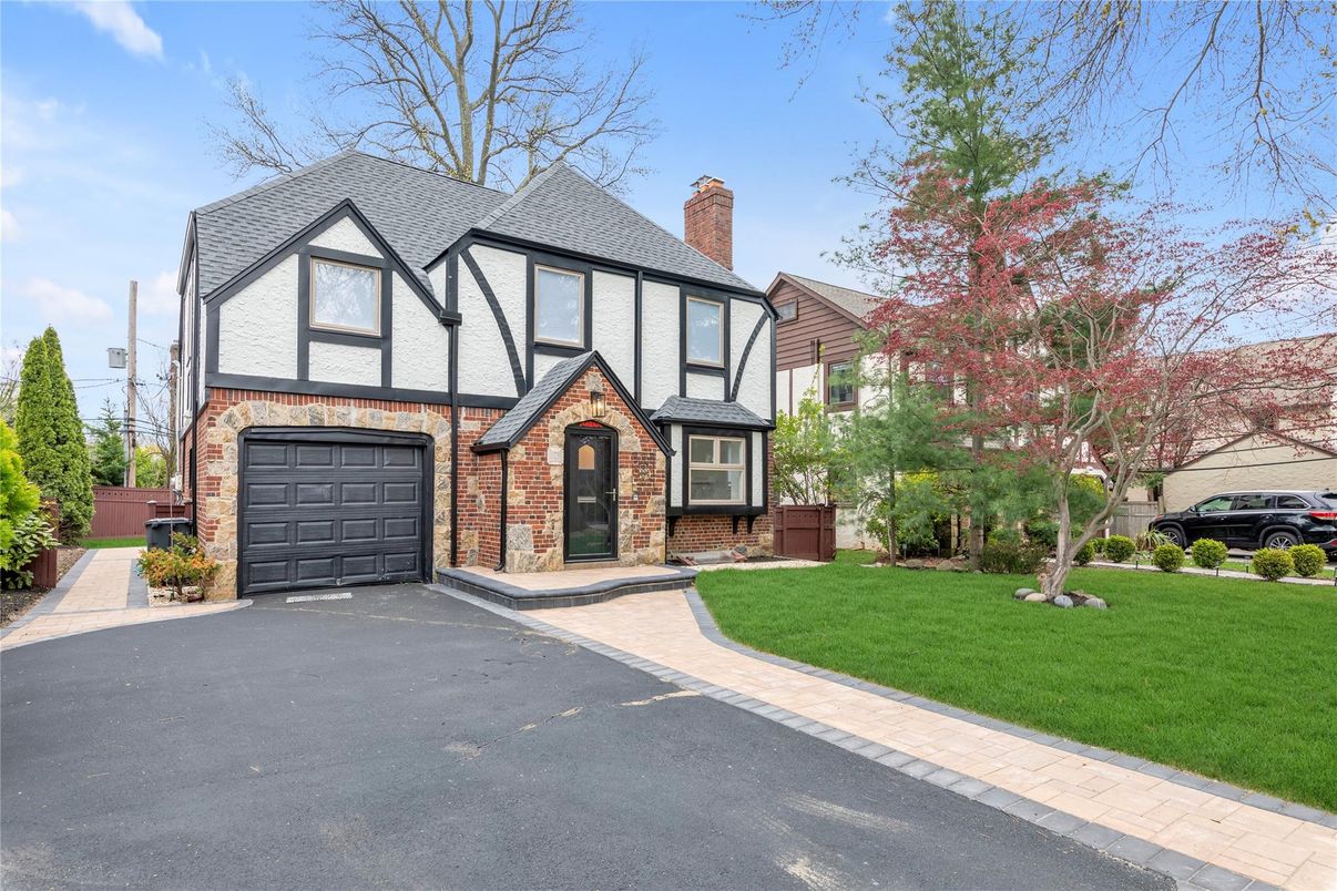 Attached, Exterior, Facade, Brick Facade, Tudor Revival