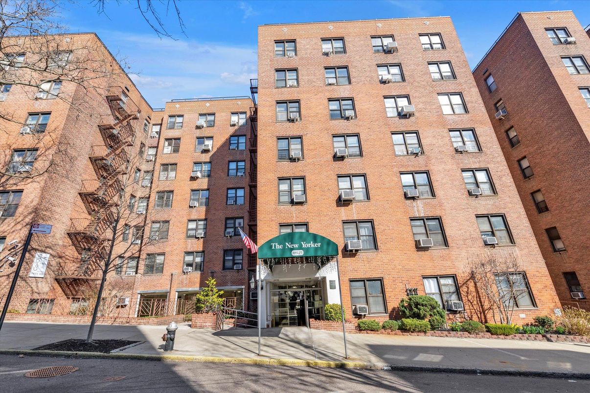 Exterior, Facade, Brick Facade, Condo Building