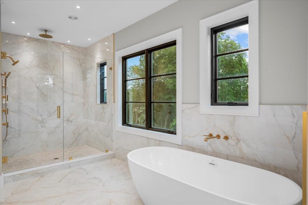 Bathroom, Free Standing Baths, Glass Shower, Interior, Marble, Marble Walls, Recessed Lighting
