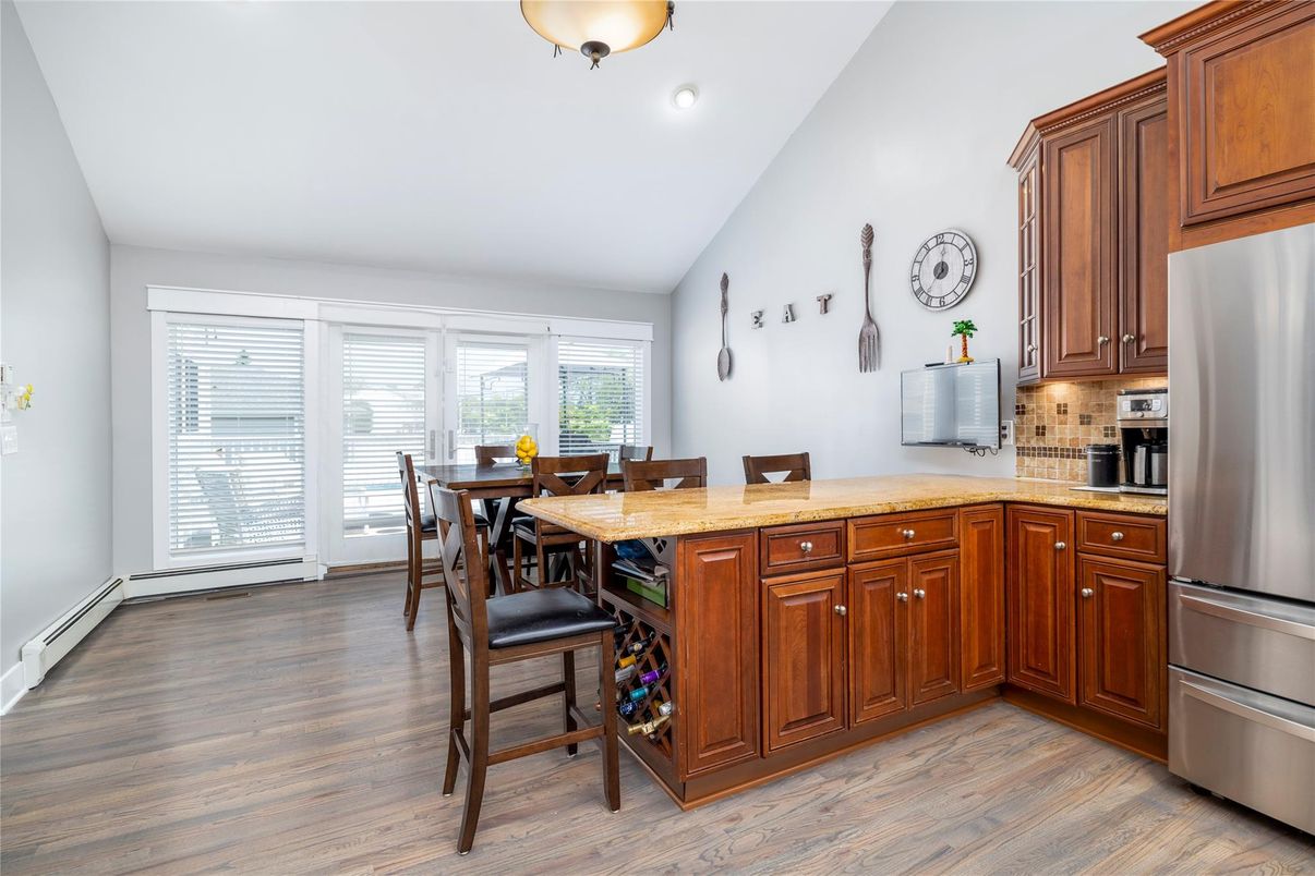Dining room, Interior, Kitchen, Recessed Lighting, Stainless Steel Appliances, Wood Texture Flooring