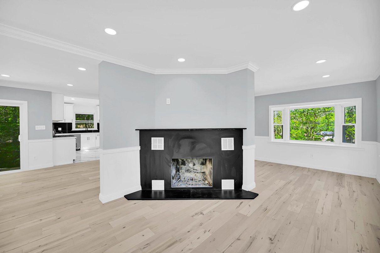 Empty room, Fireplace, Interior, Kitchen, Recessed Lighting, Wood Texture Flooring