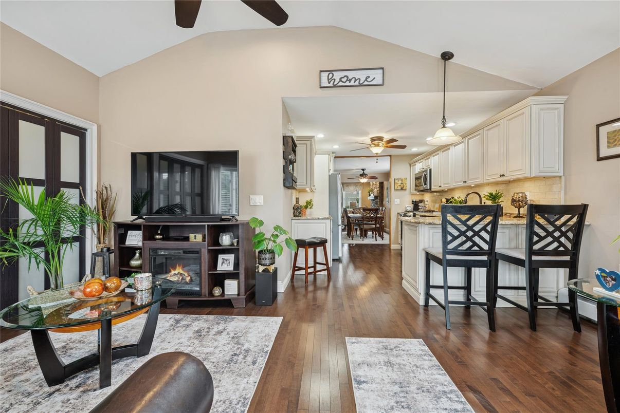 Dining room, Fireplace, Interior, Kitchen, Pendant Lights, Recessed Lighting, Wood Texture Flooring