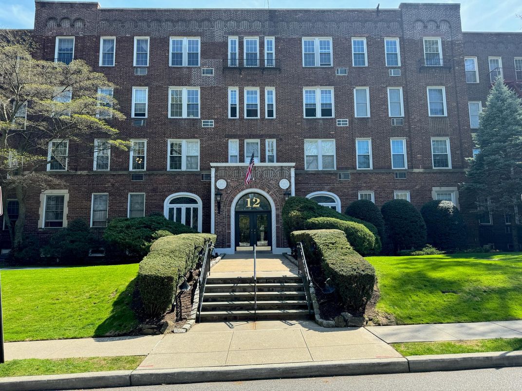 Exterior, Facade, Brick Facade, Condo Building