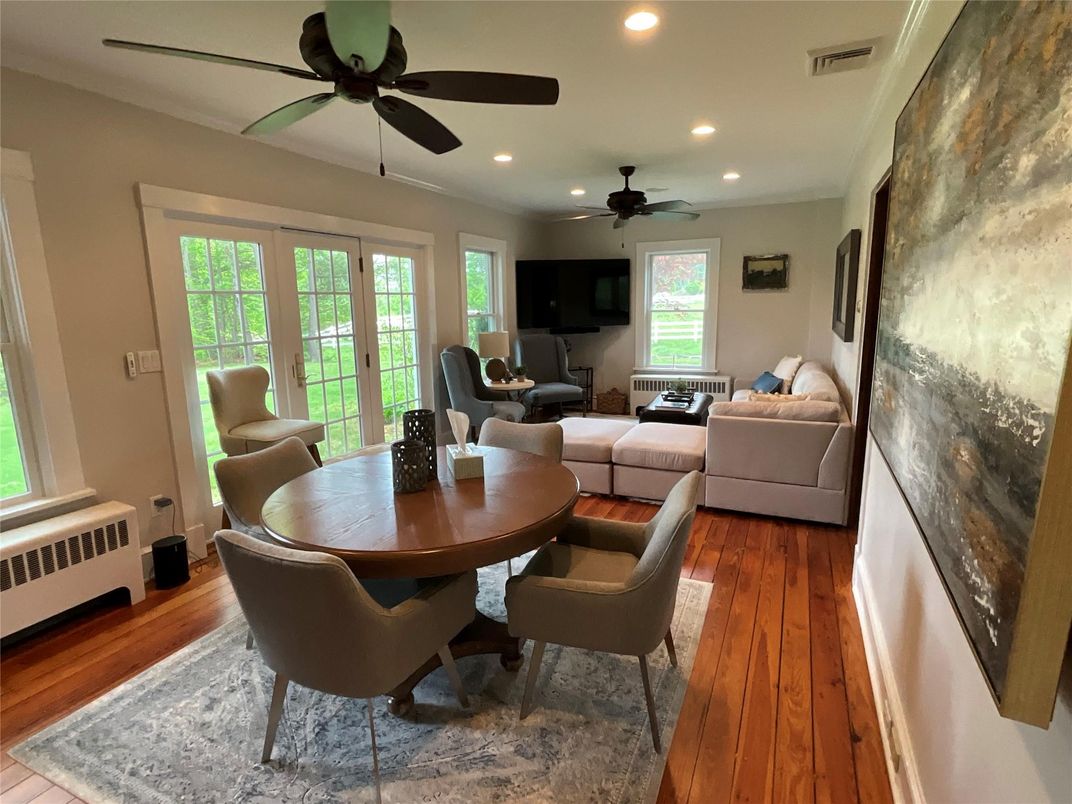 Dining room, Interior, Living room, Recessed Lighting, Stone Walls, Wood Texture Flooring