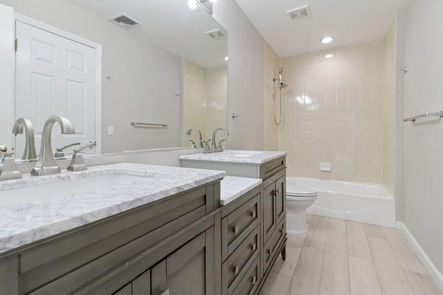 Bathroom, Dual Sink Vanities, Interior, Recessed Lighting, Wood Texture Flooring
