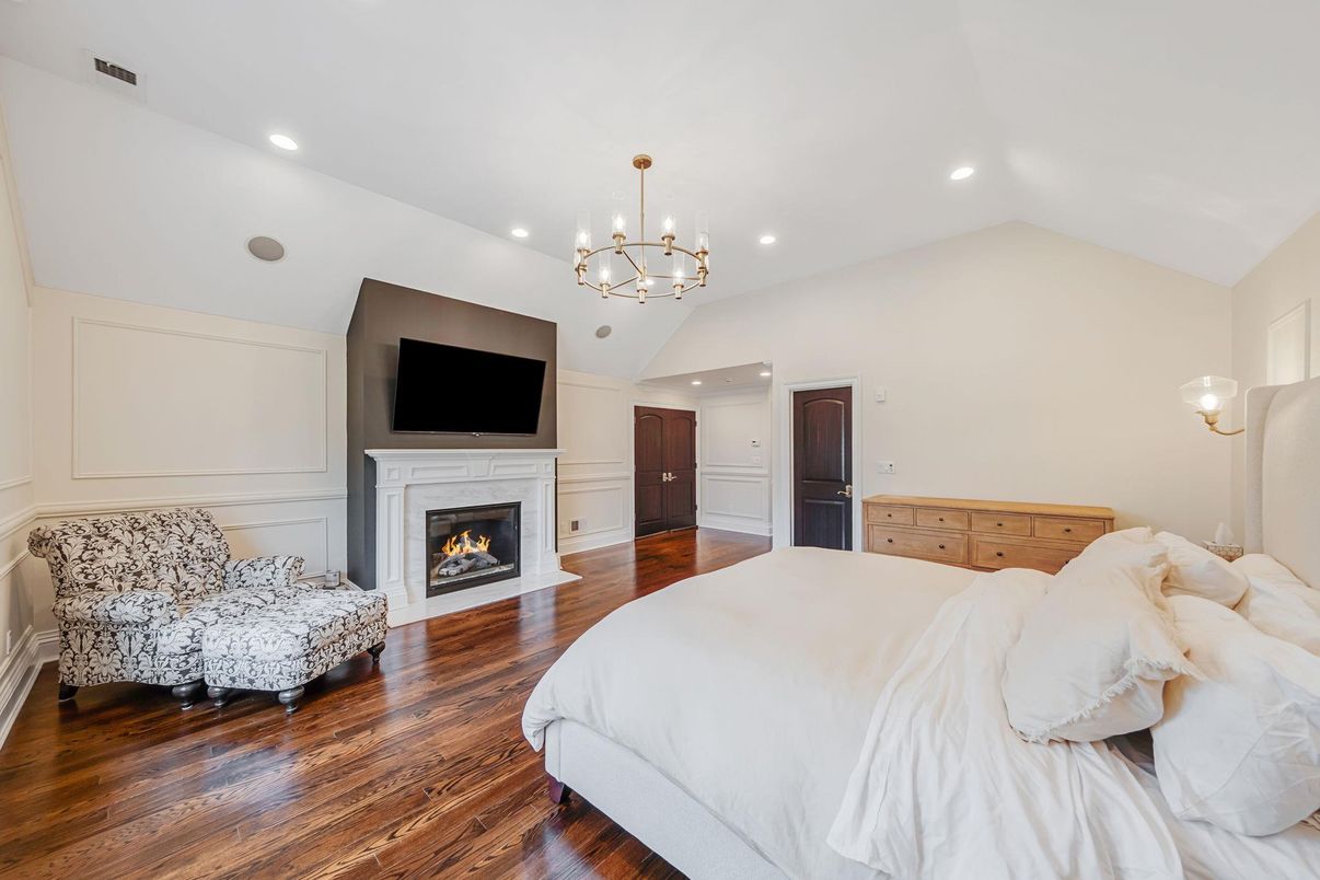 Bedroom, Fireplace, Interior, Pendant Lights, Recessed Lighting, Wood Texture Flooring