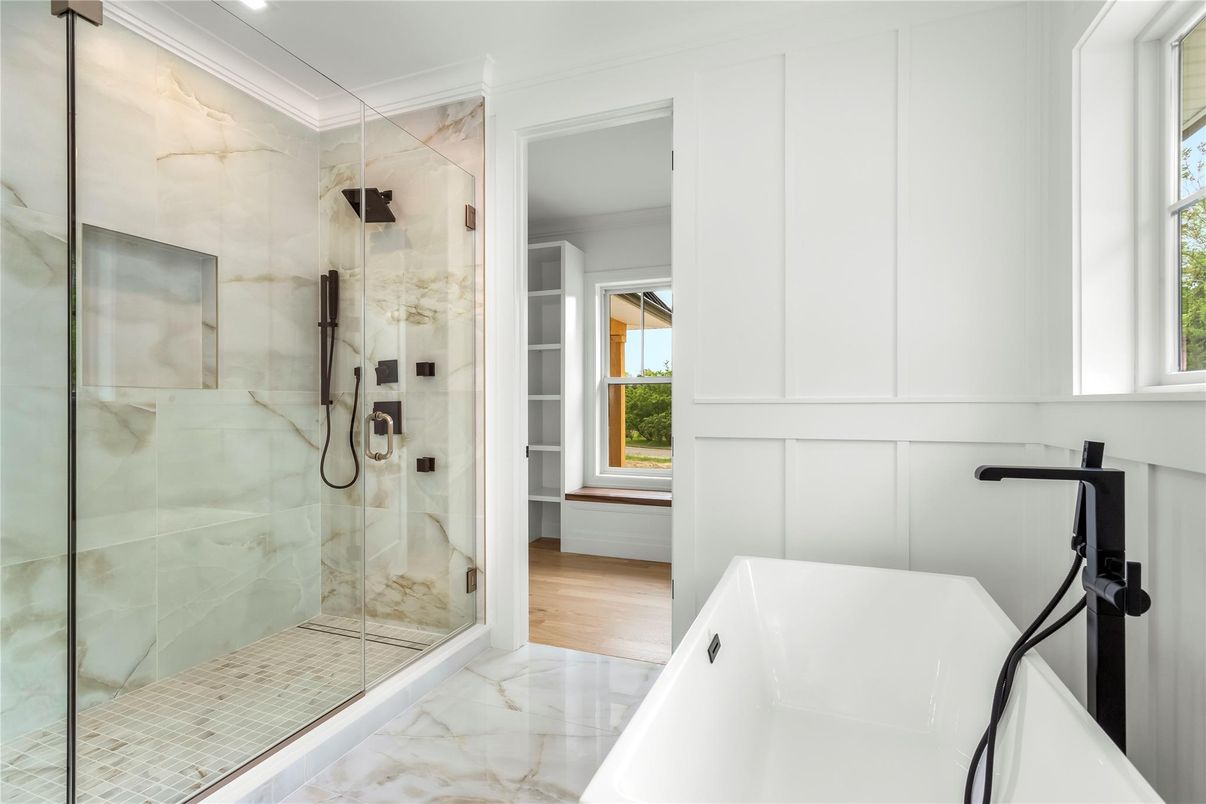 Bathroom, Free Standing Baths, Glass Shower, Interior, Marble, Marble Walls, Recessed Lighting, Wood Texture Flooring