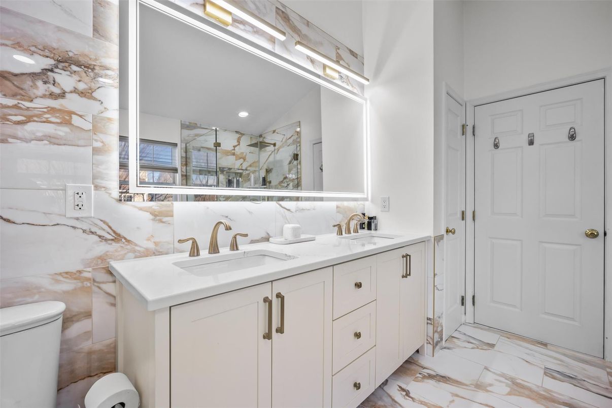 Bathroom, Dual Sink Vanities, Interior, Marble, Marble Walls, Recessed Lighting
