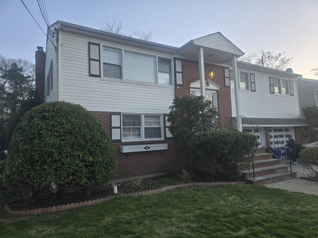 Exterior, Facade, Brick Facade, Raised Ranch