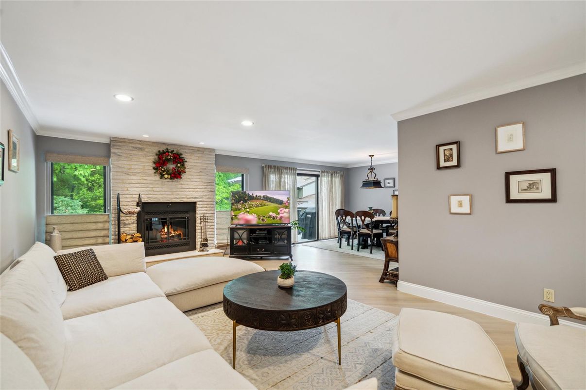 Dining room, Fireplace, Interior, Living room, Pendant Lights, Recessed Lighting, Stone Walls, Wood Texture Flooring