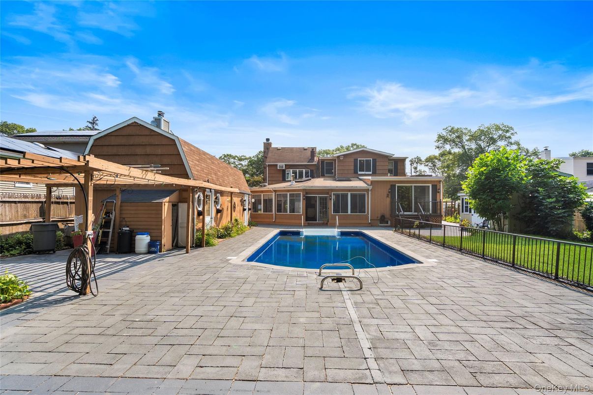 Exterior, Pool, Solar Panels
