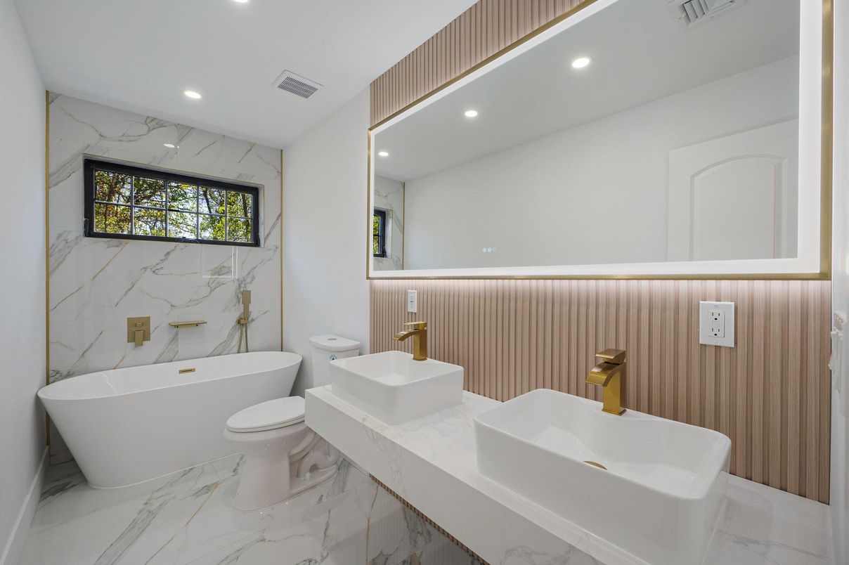 Bathroom, Dual Sink Vanities, Free Standing Baths, Interior, Marble, Marble Walls, Recessed Lighting
