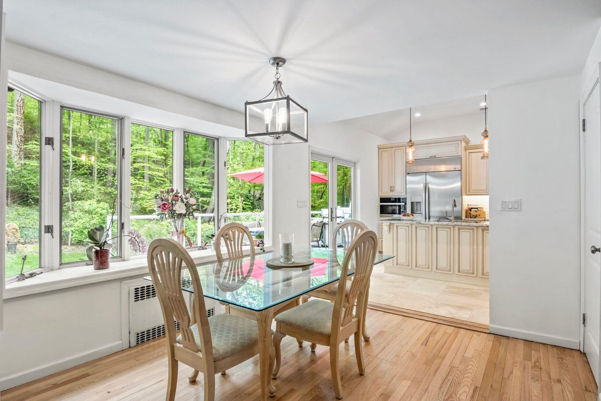 Dining room, Interior, Kitchen, Pendant Lights, Stainless Steel Appliances, Wood Texture Flooring