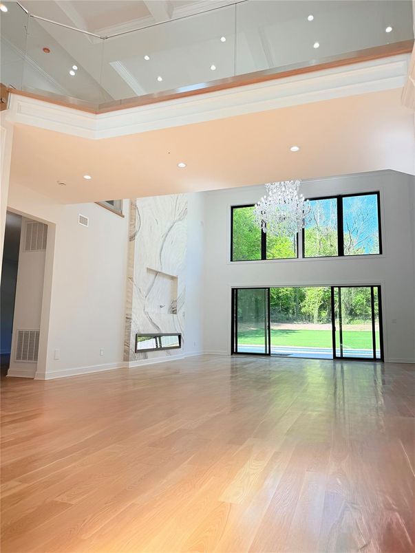 Empty room, Interior, Marble Walls, Recessed Lighting, Wood Texture Flooring