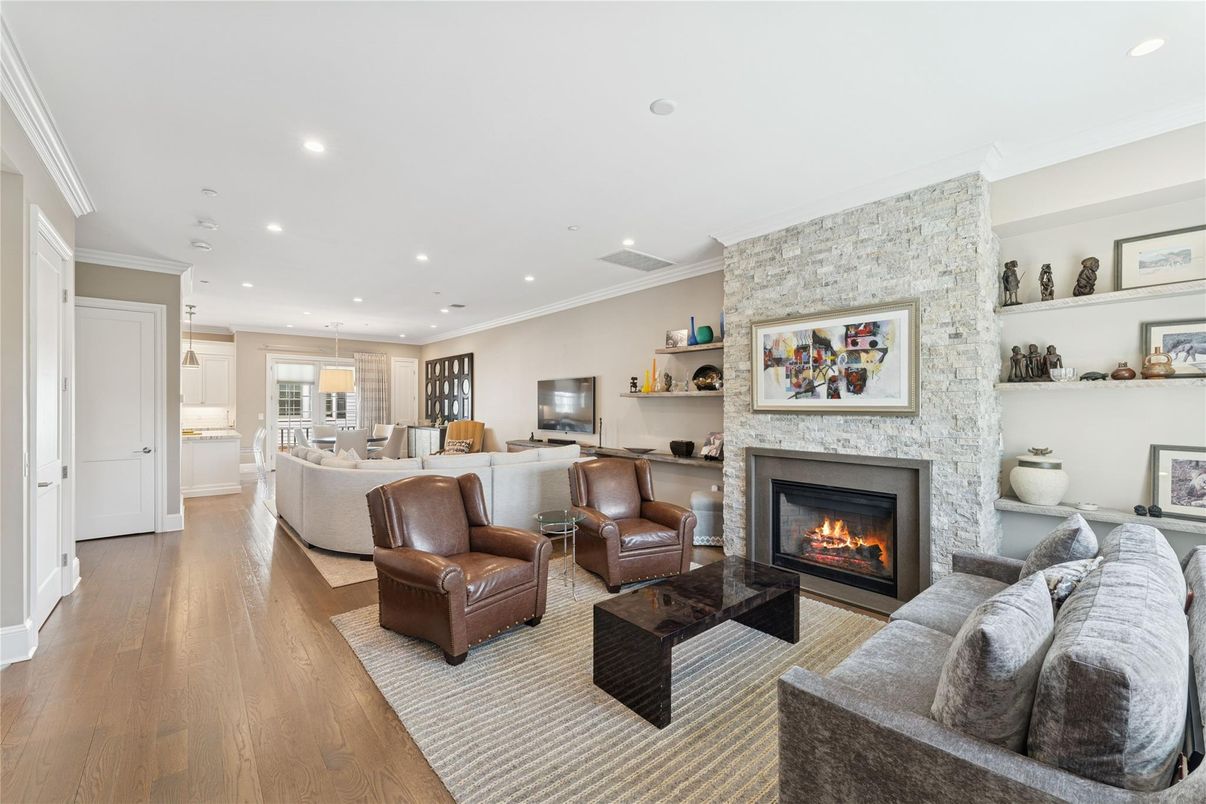 Fireplace, Interior, Living room, Recessed Lighting, Stone Walls, Wood Texture Flooring
