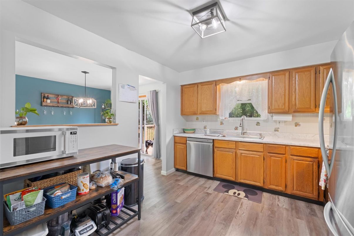 Interior, Kitchen, Pendant Lights, Stainless Steel Appliances, Wood Texture Flooring