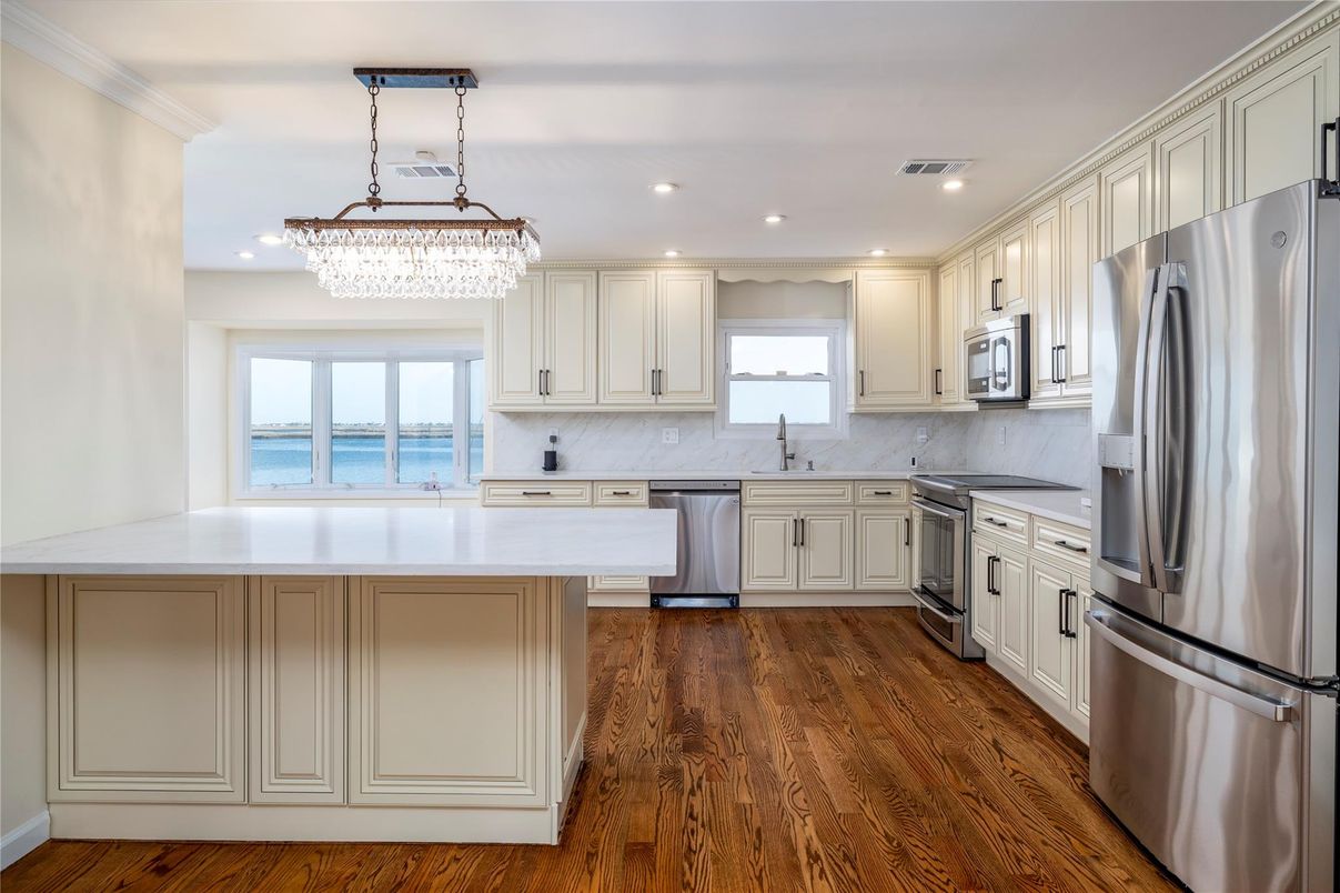 Chandelier, Interior, Kitchen, Recessed Lighting, Stainless Steel Appliances, Wood Texture Flooring