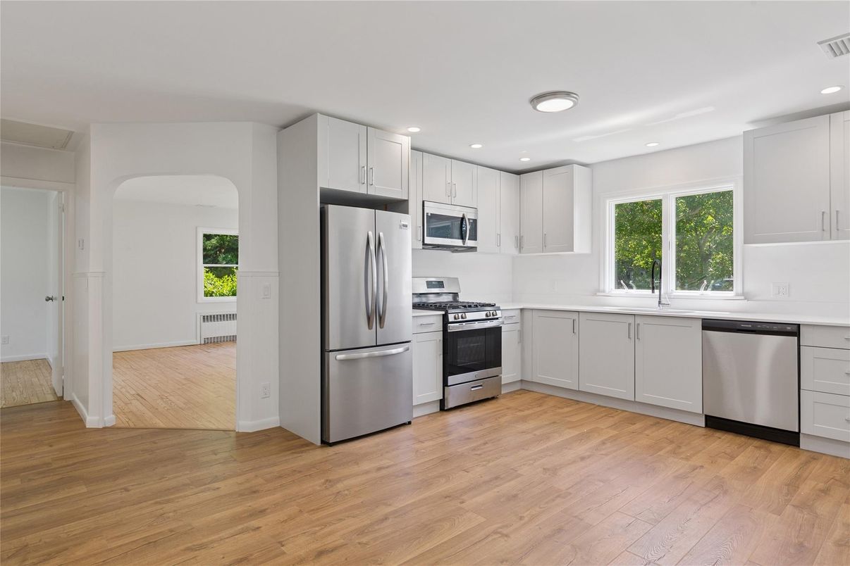 Interior, Kitchen, Recessed Lighting, Stainless Steel Appliances, Wood Texture Flooring