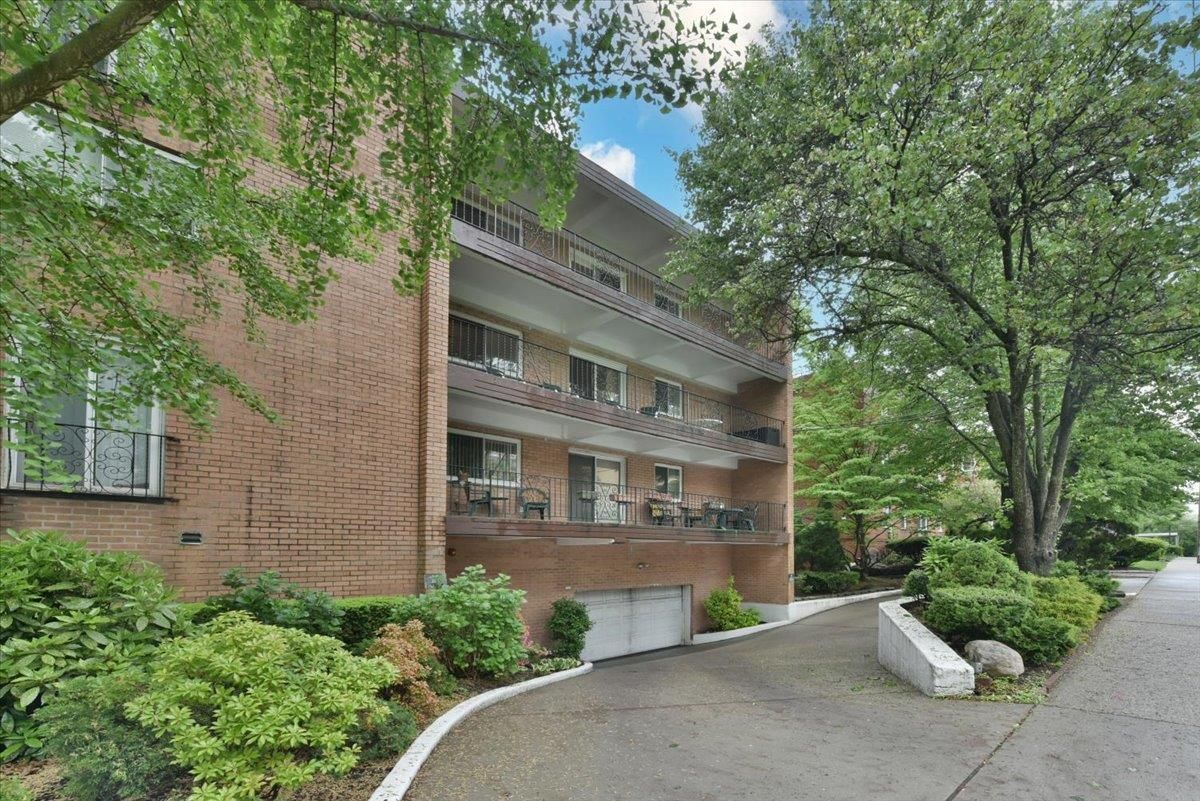 Attached, Exterior, Facade, Brick Facade, Condo Building