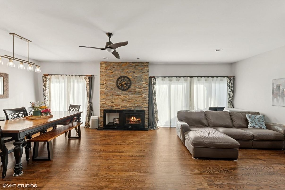 Dining room, Fireplace, Interior, Living room, Pendant Lights, Stone Walls, Wood Texture Flooring