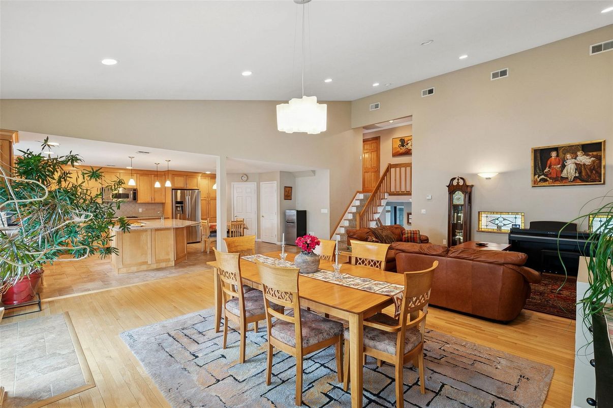 Dining room, Interior, Kitchen, Living room, Pendant Lights, Piano, Recessed Lighting, Stainless Steel Appliances, Wood Texture Flooring