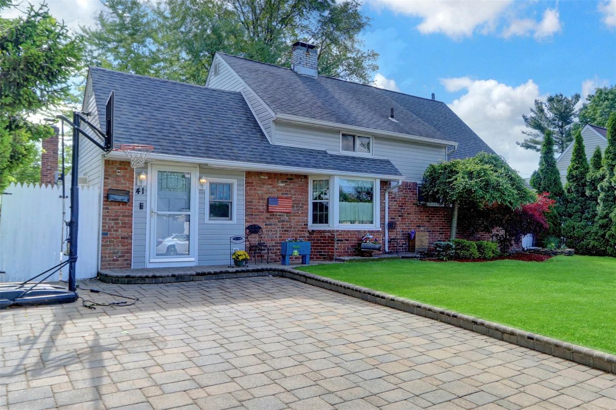 Exterior, Facade, Brick Facade, Cape Cod