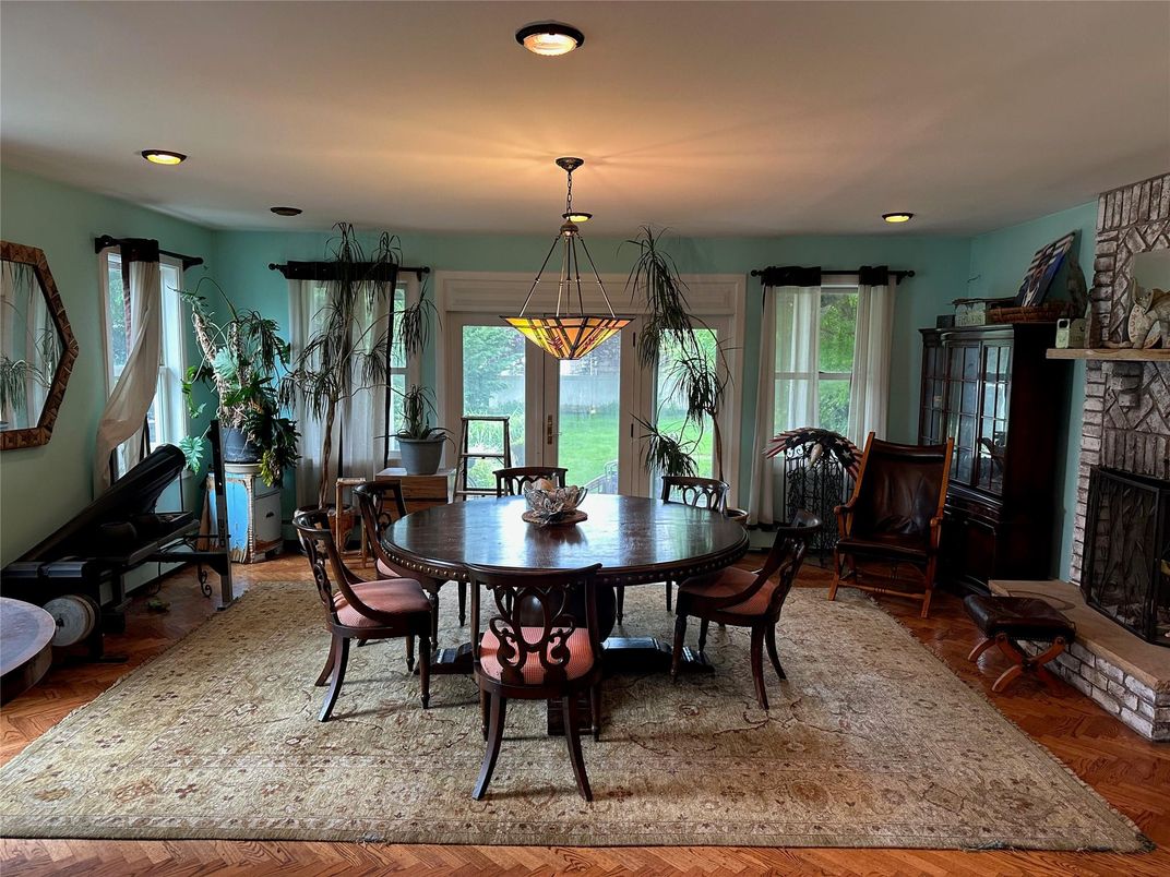 Dining room, Fireplace, Interior, Pendant Lights, Recessed Lighting, Wood Texture Flooring