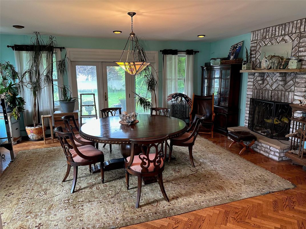 Dining room, Fireplace, Interior, Pendant Lights, Recessed Lighting, Wood Texture Flooring